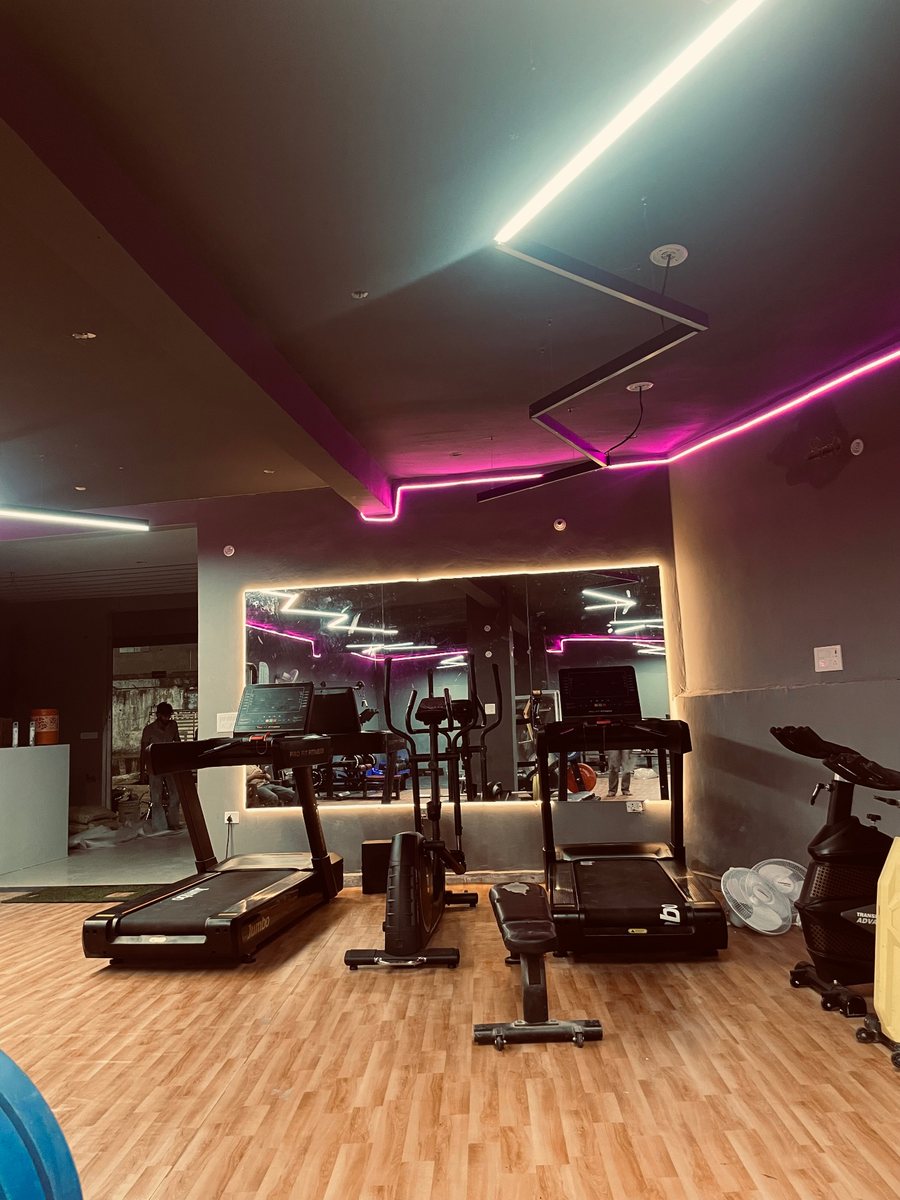 DreamFit cardio zone with treadmills and mirrored wall